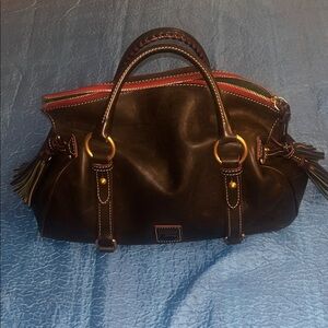 Chic Black Leather Hobo with Tassel Accents